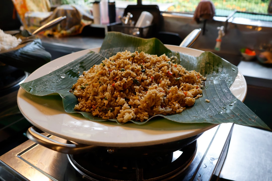 A plate of rice served on banana leaves